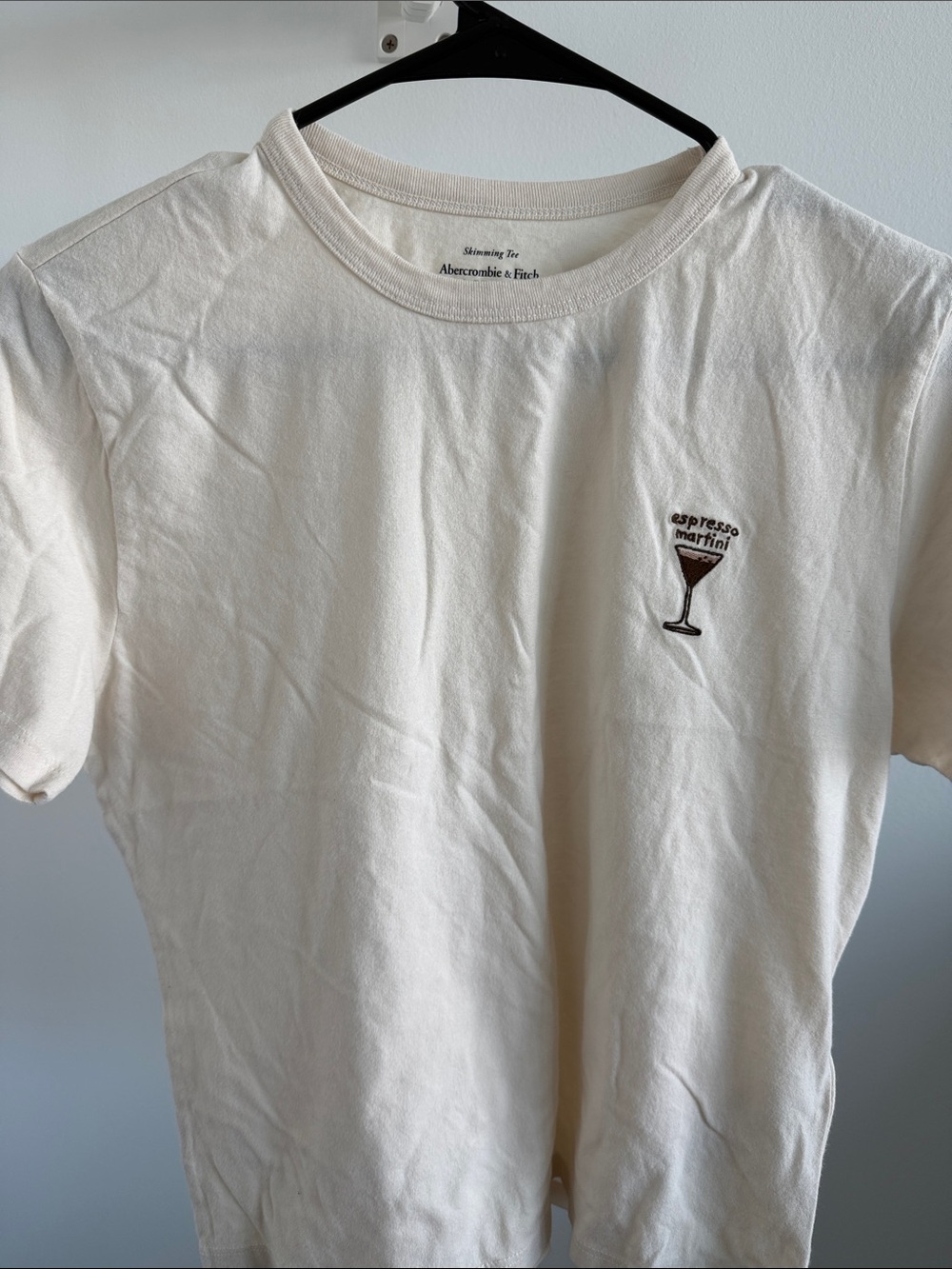 Abercrombie & Fitch Cream skimming Graphic Tee with Espresso Martini Motif BNWT
